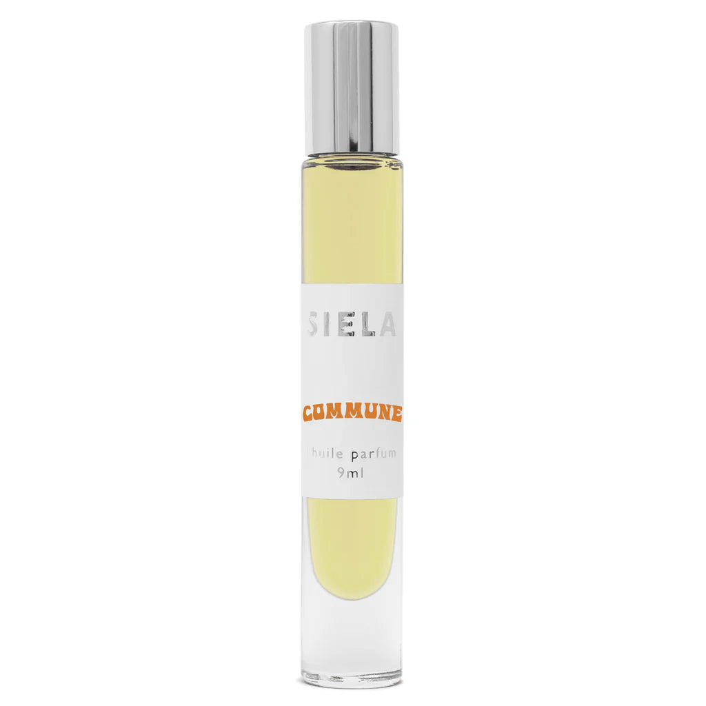A clear rollerball bottle with yellow liquid inside, labeled 'SIELA COMMUNE 9ml', with a silver cap.