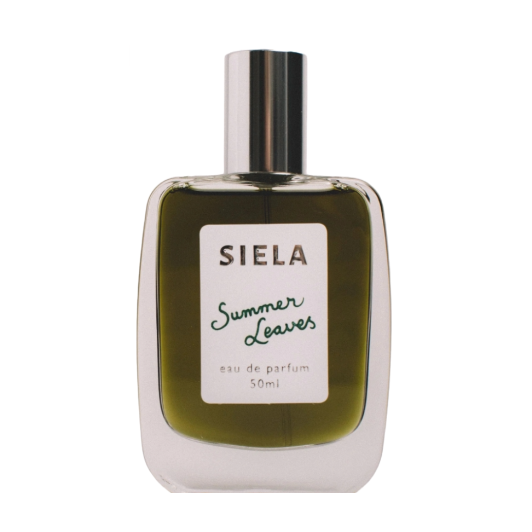 A bottle of Siela perfume with the label 'Summer Leaves eau de parfum 50ml'.