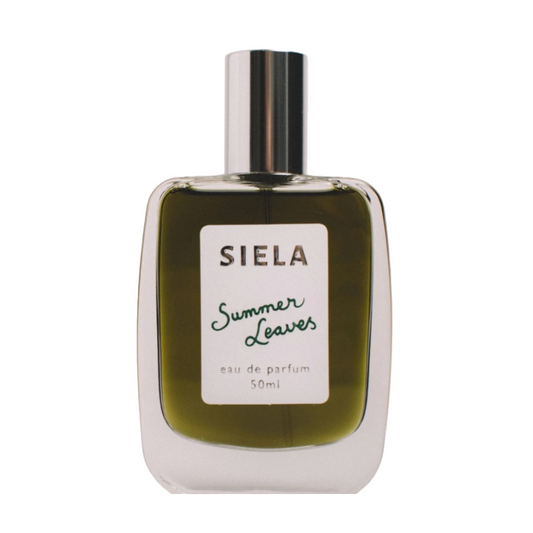 A bottle of Siela perfume with the label 'Summer Leaves eau de parfum 50ml'.