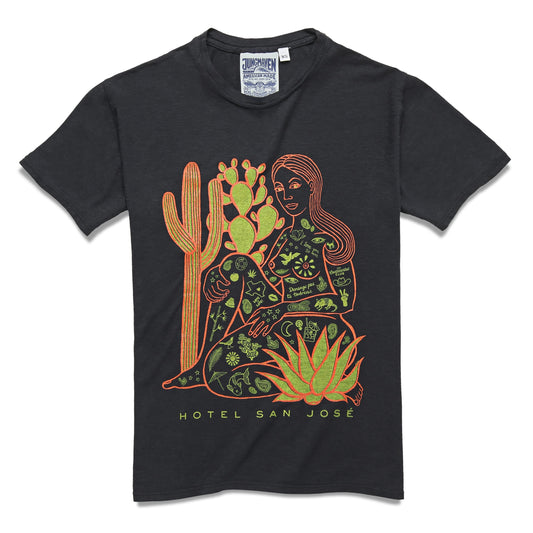 Heathered tshirt with line work illustration of  a woman covered in Austin Texas icons with various cacti in front and behind her with text that reads 'HOTEL SAN JOSE' underneath. 