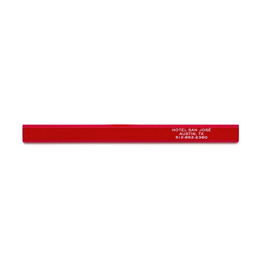 A red carpenter pencil with 'Hotel San Jose' printed in white text on the side.