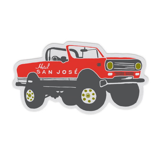 A sticker depicting a red and black truck with 'Hotel San Jose' written on the side.